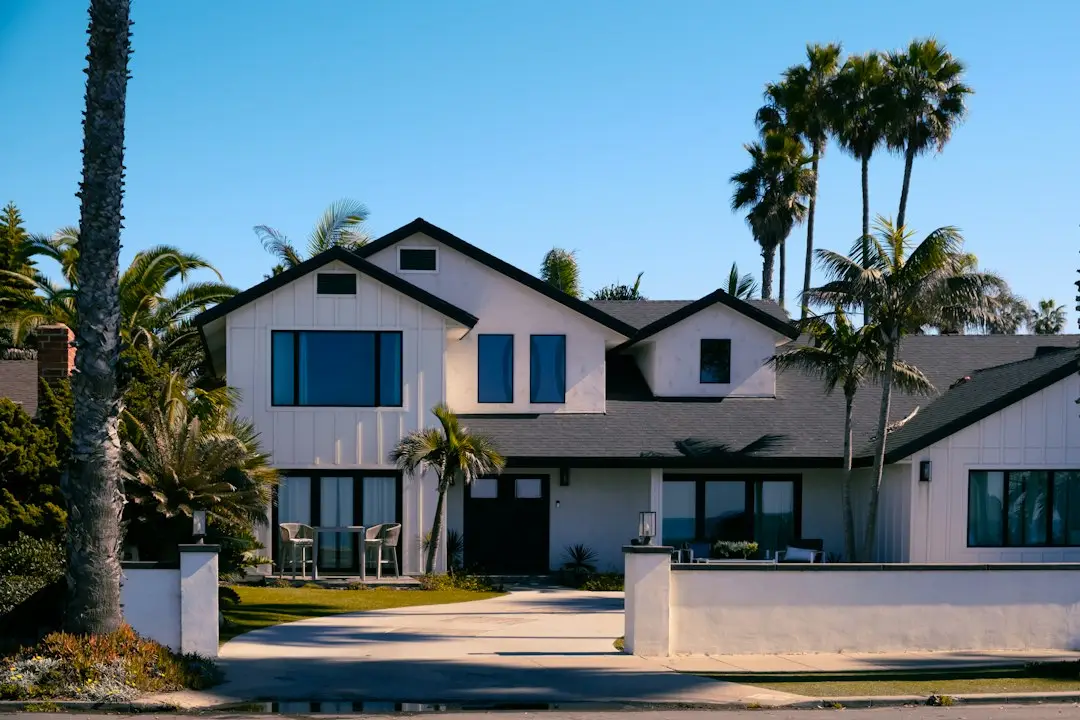 House and landscaped grounds illustrating United States real estate.