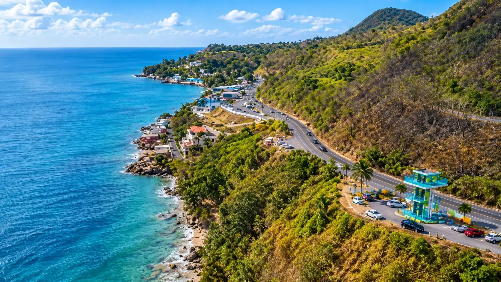 Scenic coastal landscape representing the local experience in Añasco, Puerto Rico, with a winding road, tropical hills, seaside communities, and blue Caribbean waters.