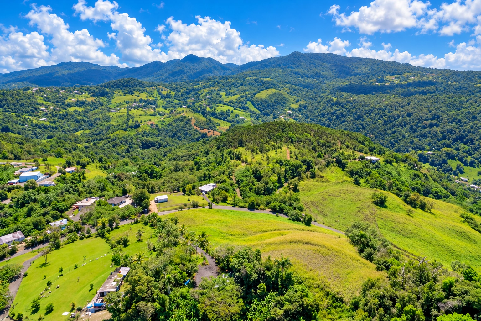 AI-enhanced aerial photograph of green hills, homes and mountain scenery in Hato Puerco, Canóvanas.