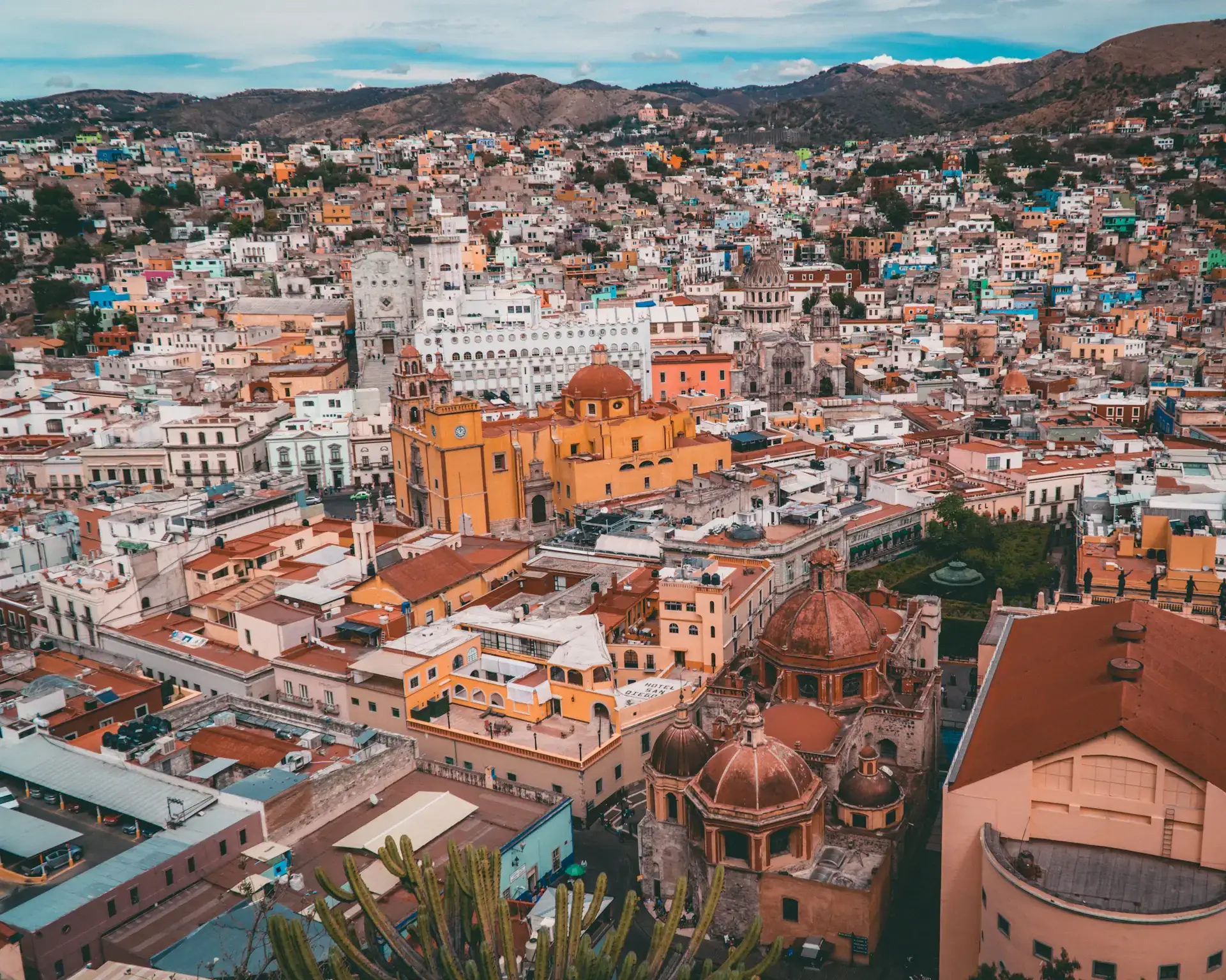 Colorful Guanajuato buildings, churches and surrounding hills in Mexico